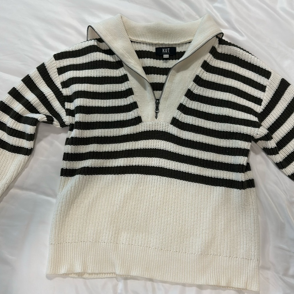 Green and cream sweater